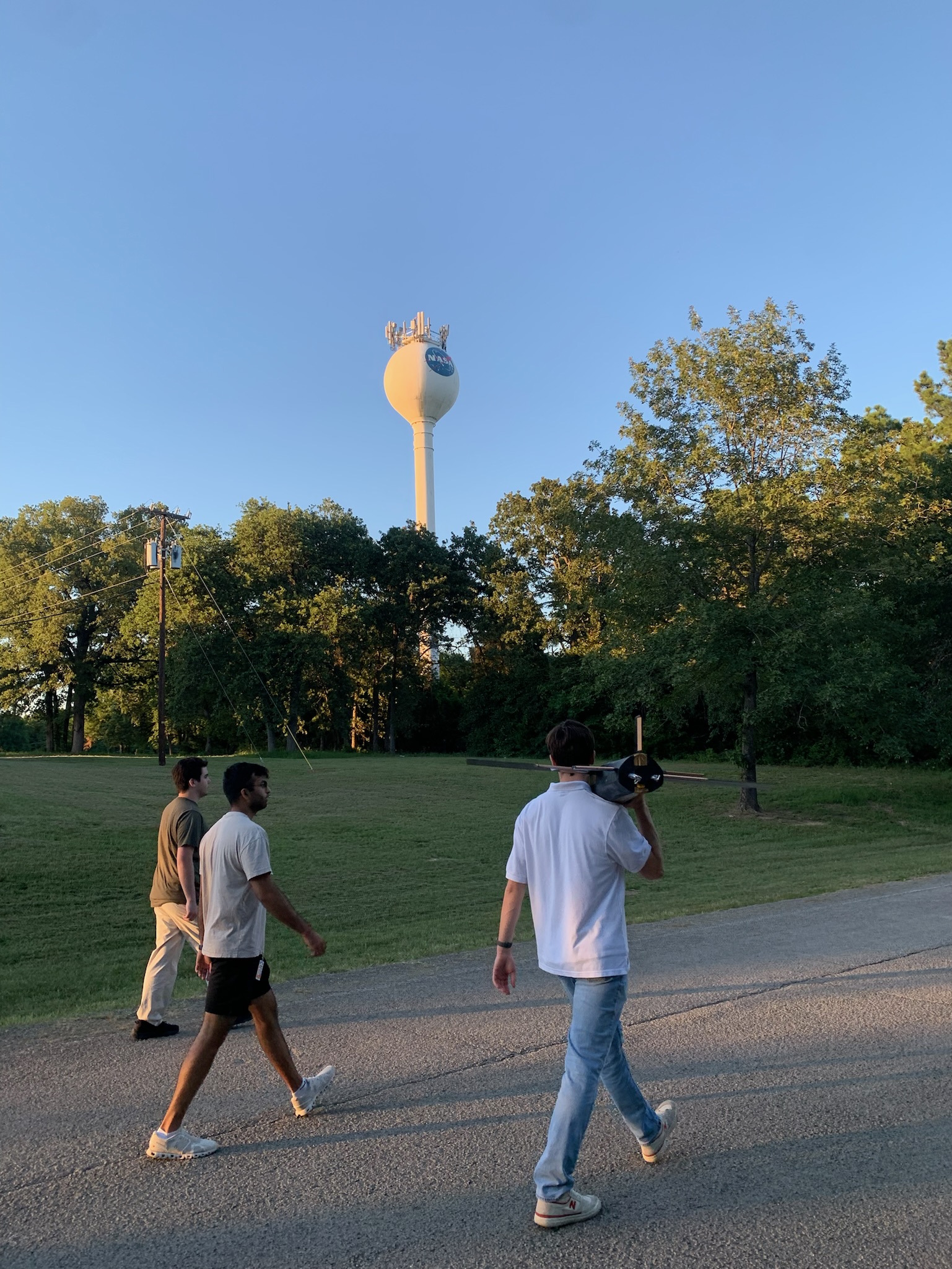 The team walking with the vehicle at NASA CSBF (Jun 2024)